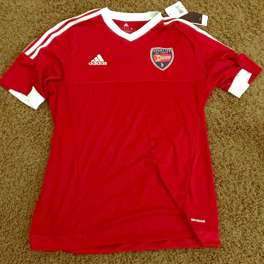 It is a red adidas shirt
